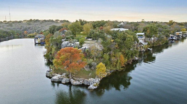 aerial view at dusk with a water view