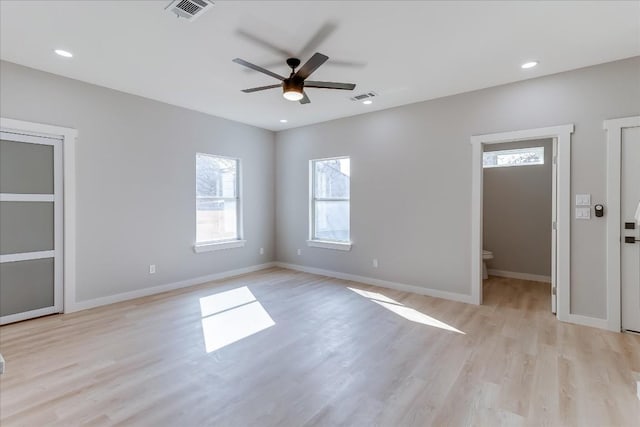 interior space with light hardwood / wood-style flooring and ceiling fan