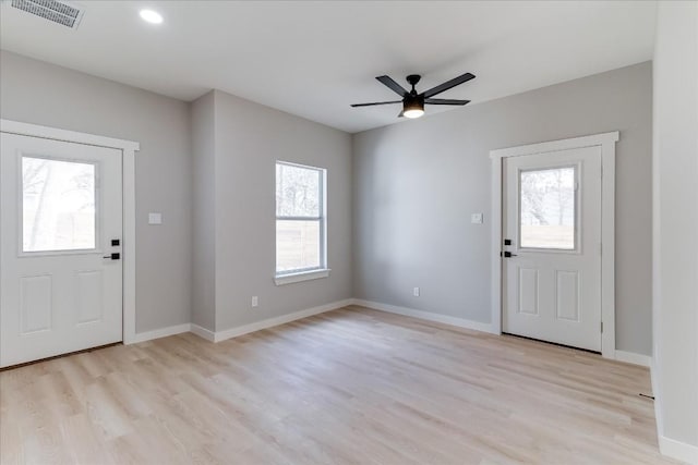 entrance foyer with ceiling fan and light hardwood / wood-style floors