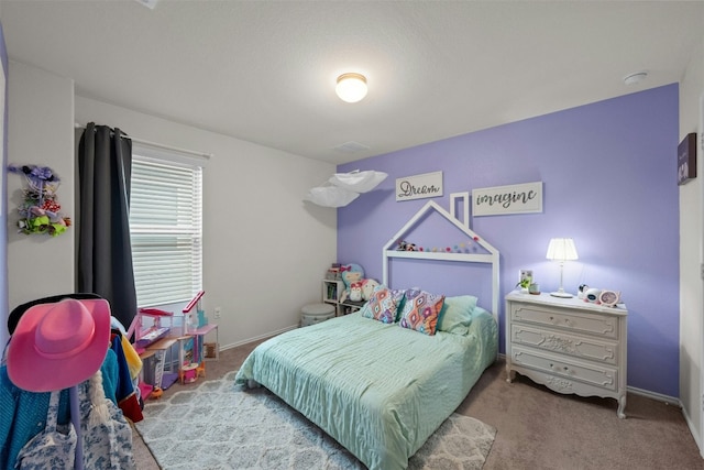 bedroom featuring carpet flooring and baseboards