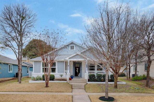 bungalow with a front yard