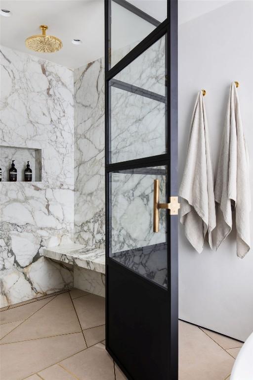 bathroom featuring tile patterned floors and a shower