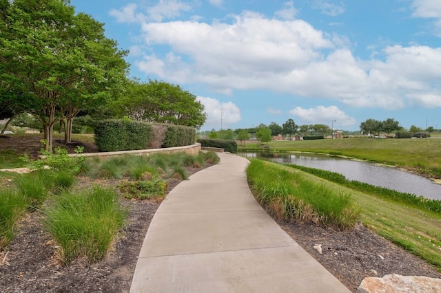 view of home's community featuring a water view