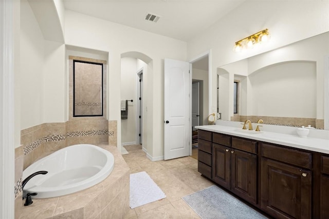 17408 Wildrye Dr, Austin, TX 78738 - bathroom featuring a bath, vanity, and tile patterned flooring