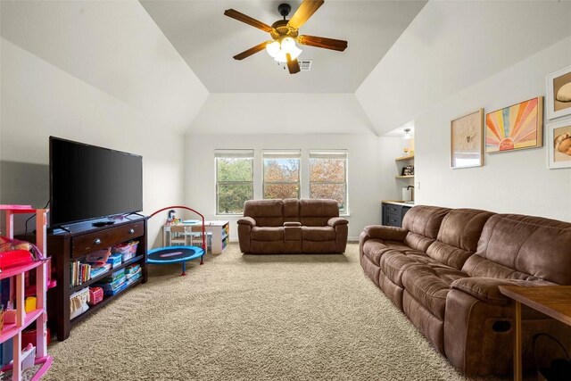 living room with lofted ceiling, carpet flooring, and ceiling fan