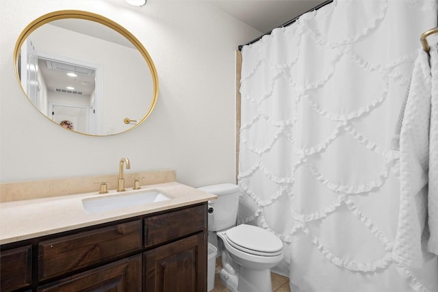 bathroom featuring walk in shower, tile patterned floors, vanity, and toilet