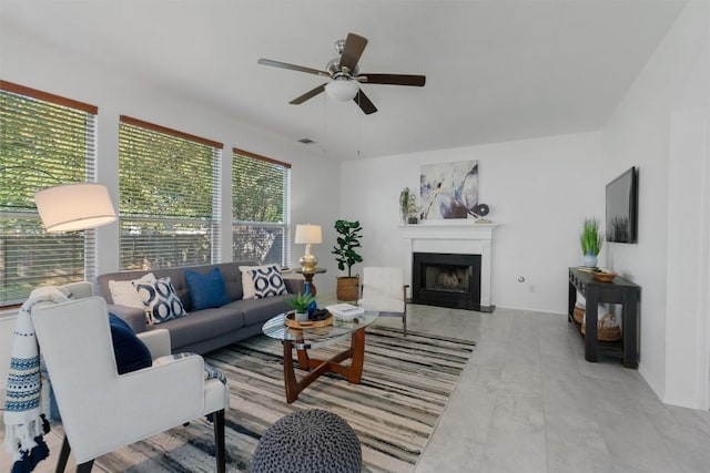 14420 Ballycastle Trl, Austin, TX 78717 - living room featuring a ceiling fan and a fireplace with raised hearth