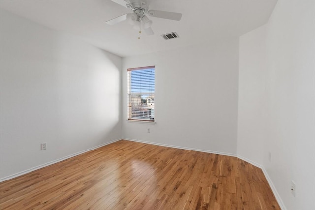 unfurnished room featuring ceiling fan and light wood-type flooring