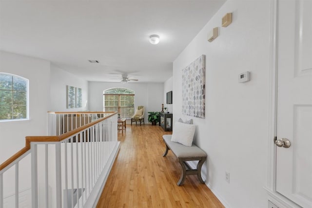 14420 Ballycastle Trl, Austin, TX 78717 - corridor with an upstairs landing and light wood-type flooring