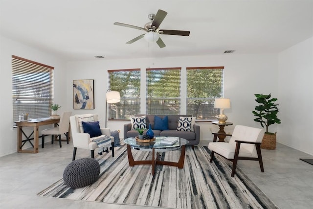 14420 Ballycastle Trl, Austin, TX 78717 - living room with healthy amount of natural light, a ceiling fan, and baseboards