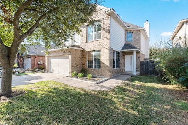 view of front facade with a garage and a front yard