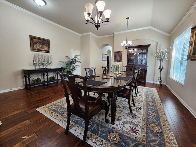 dining room with vaulted ceiling, dark hardwood / wood-style floors, and an inviting chandelier