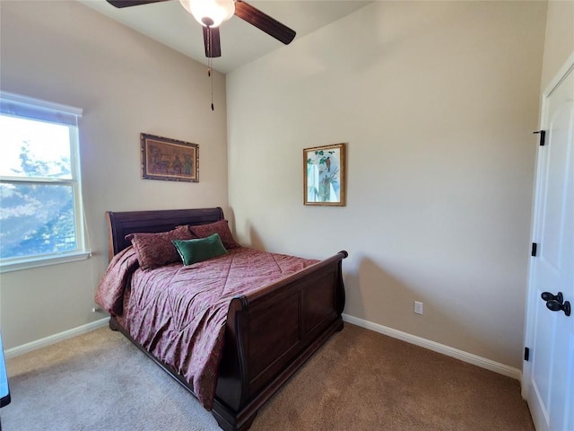 bedroom featuring ceiling fan and light colored carpet