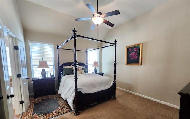 bedroom featuring a ceiling fan, carpet, vaulted ceiling, and baseboards