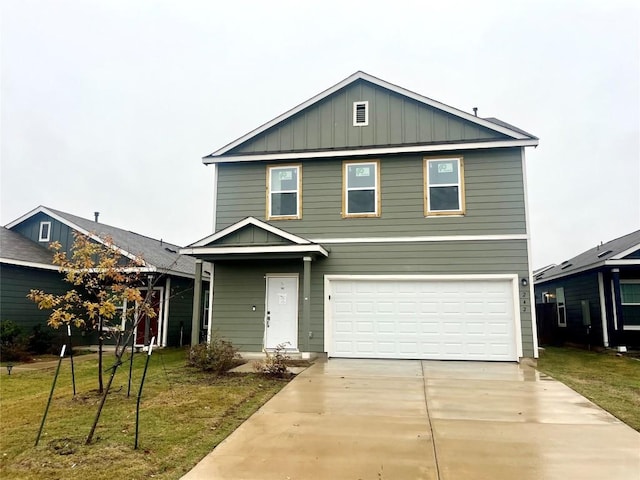 242 Geode Gln, Maxwell, TX 78656 - view of front of house with an attached garage, board and batten siding, driveway, and a front yard