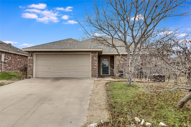 ranch-style house featuring a garage