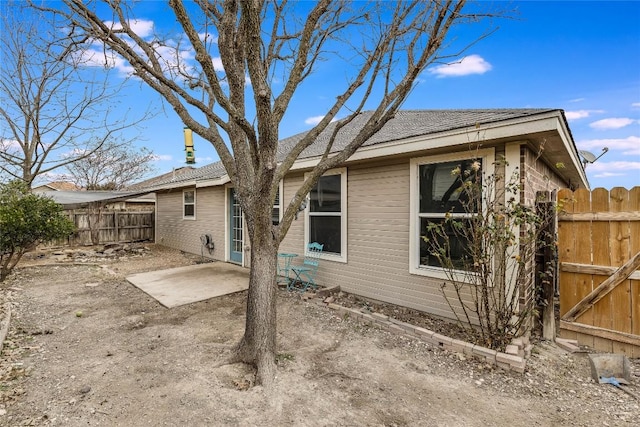 rear view of property with a patio