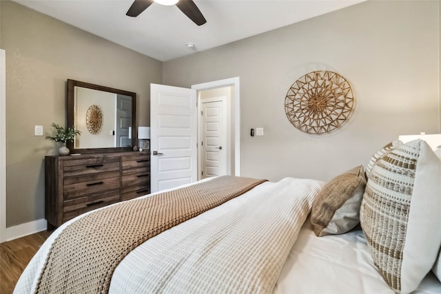 bedroom featuring wood-type flooring and ceiling fan