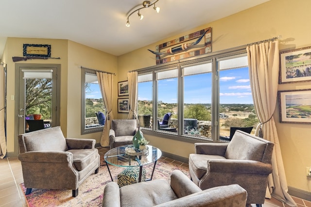 sitting room featuring tile patterned floors