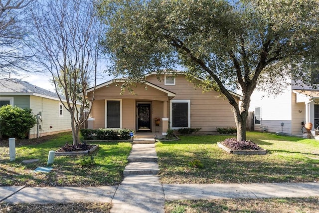 view of front of home with a front yard