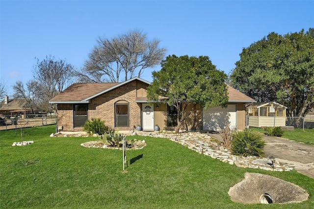 ranch-style house with driveway, brick siding, a front yard, and fence