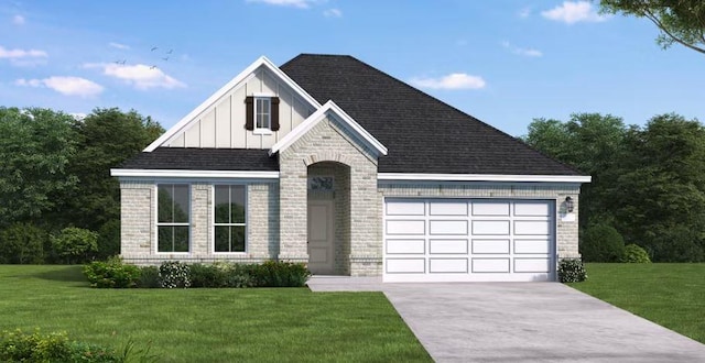 view of front of property with a garage and a front lawn