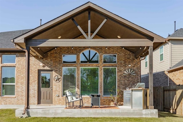 back of house featuring a patio area