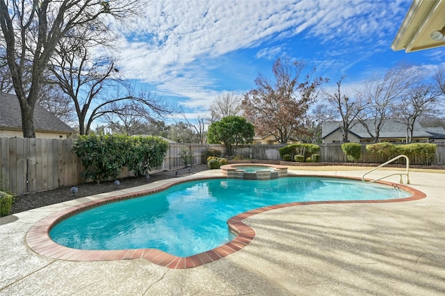 view of pool featuring an in ground hot tub and a patio area