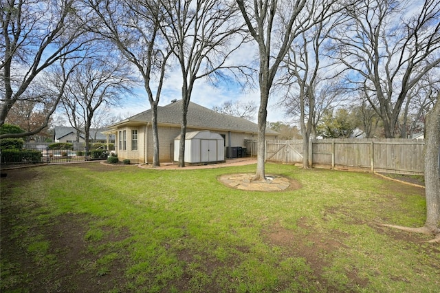 view of yard with cooling unit and a storage shed