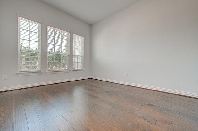 spare room featuring hardwood / wood-style flooring