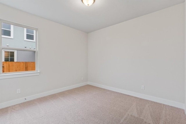 spare room with carpet flooring