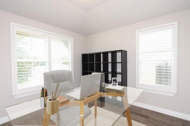 living area with hardwood / wood-style floors