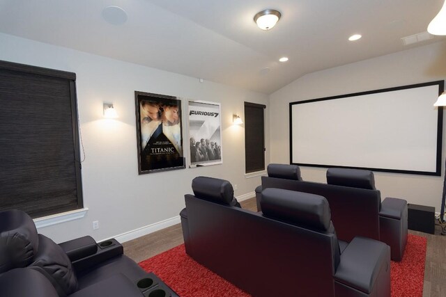 home theater with vaulted ceiling