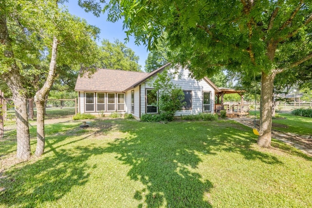 exterior space with a front lawn