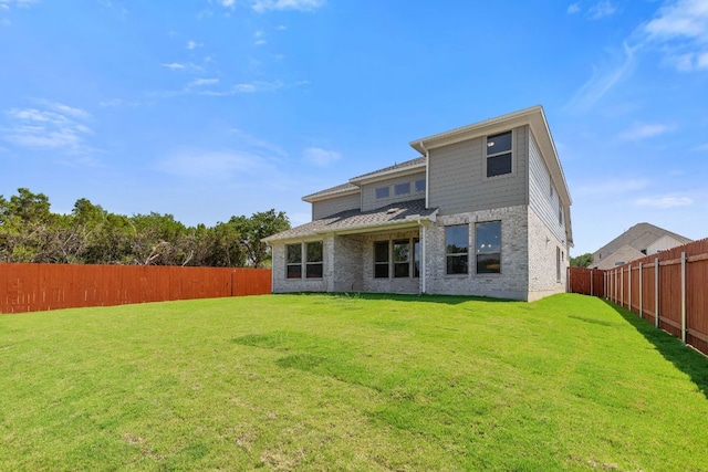 1235 Robin Trl, Round Rock, TX 78681 - rear view of house with a fenced backyard and brick siding