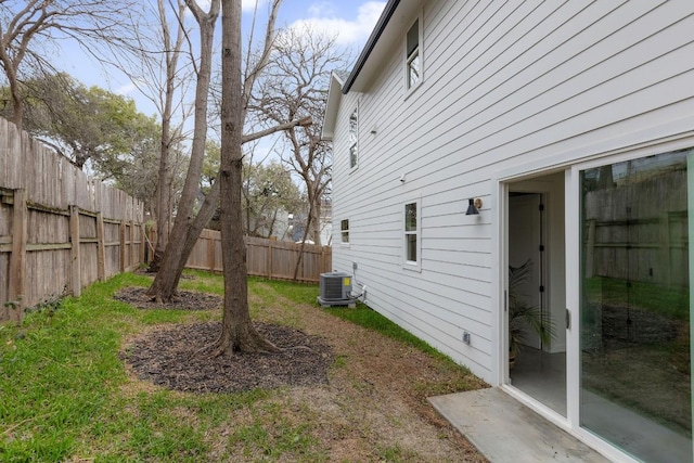 view of yard featuring central AC unit