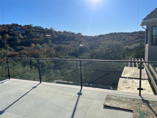 view of patio with a balcony