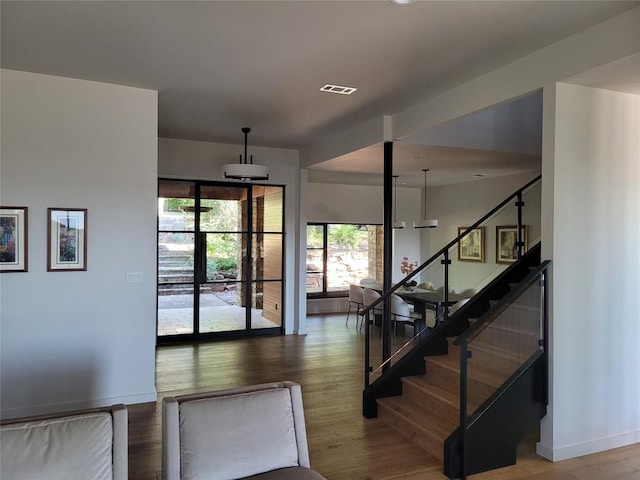 entrance foyer with hardwood / wood-style floors