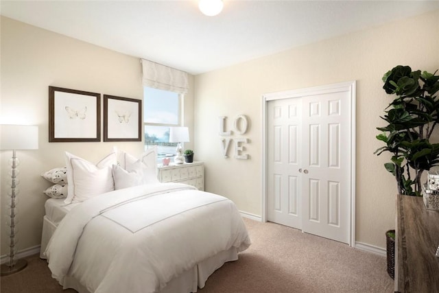 carpeted bedroom featuring a closet