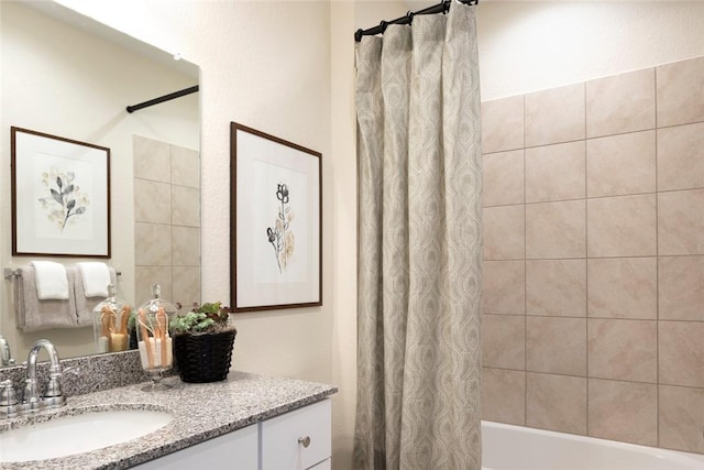 bathroom featuring vanity and shower / tub combo