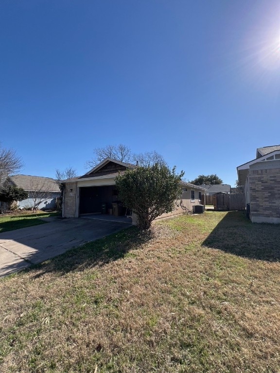 view of yard with a garage