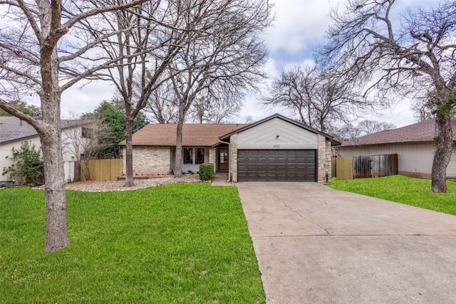 single story home with a garage and a front yard