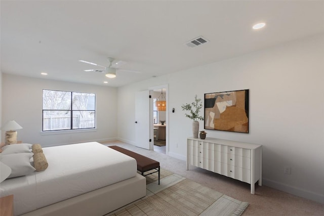 bedroom featuring ceiling fan and light colored carpet