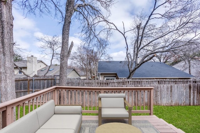 wooden terrace featuring an outdoor hangout area