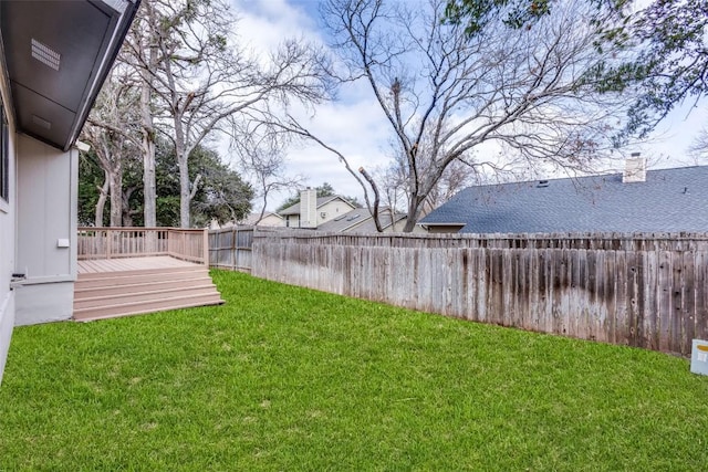 view of yard featuring a deck