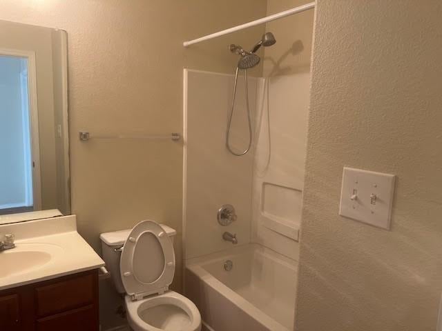 full bathroom with vanity, toilet, and shower / bath combination