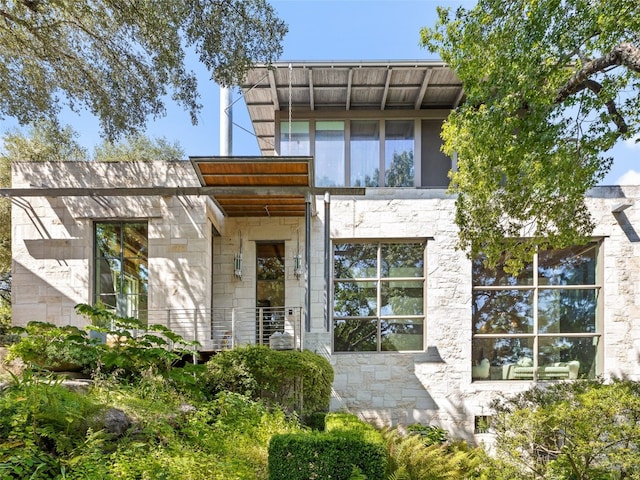 1200 Barton Creek Blvd Unit 35, Austin, TX 78735 - view of front facade with stone siding