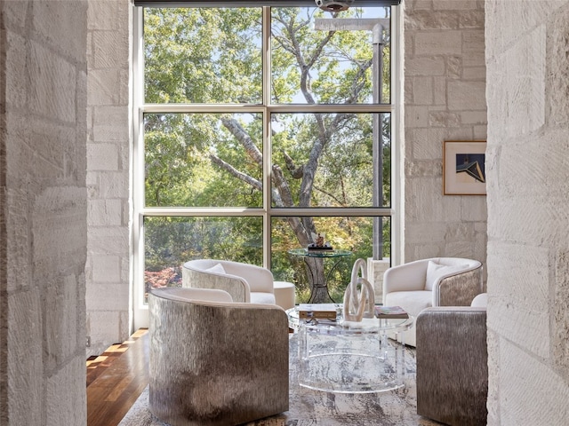 sunroom / solarium featuring plenty of natural light