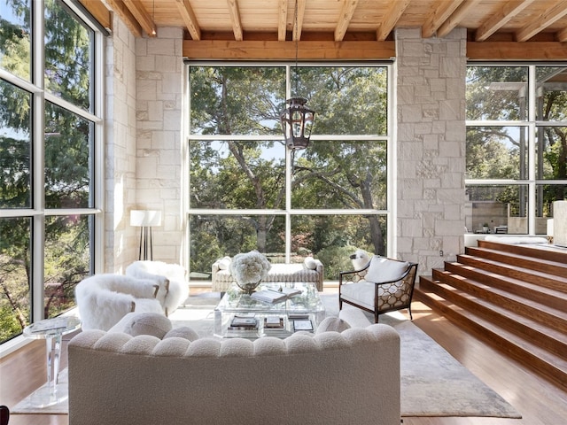 sunroom / solarium with wood ceiling and beamed ceiling