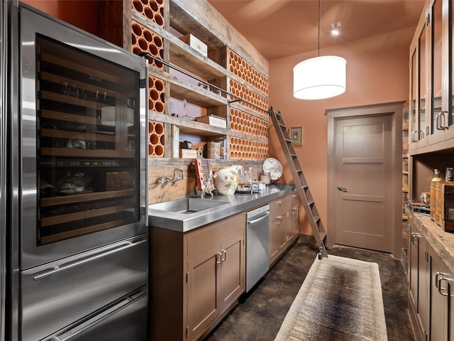 bar featuring hanging light fixtures, dishwasher, sink, and wine cooler